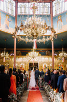 Bride and groom at altar.