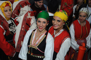 Two women wearing traditional regional costumes