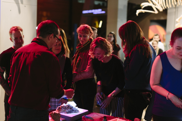 People learning about rocks and fossils at Nocturnal, Melbourne Museum.