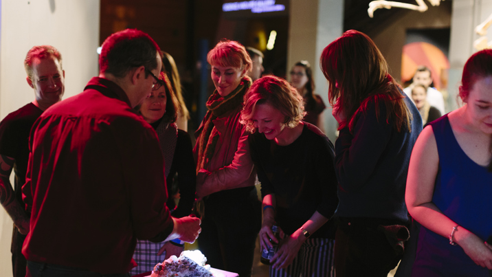 People learning about rocks and fossils at Nocturnal, Melbourne Museum.