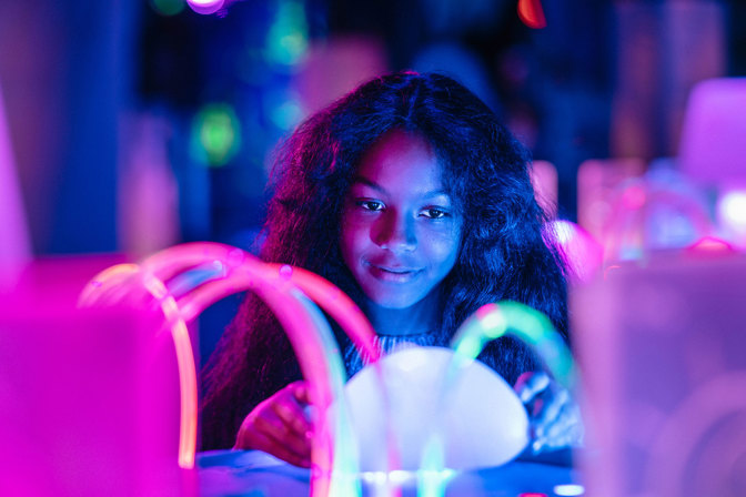 a girl with an exhibition interactive