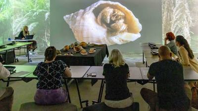 People learning how to create digital art in the Learning Lab at Melbourne Museum during a Digital Art Class.