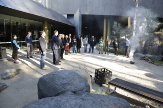 People gather in a semi circle