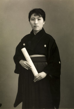 Woman in a formal crested kimono