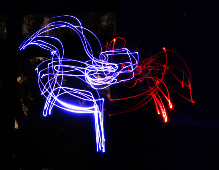 Blue and red light on black