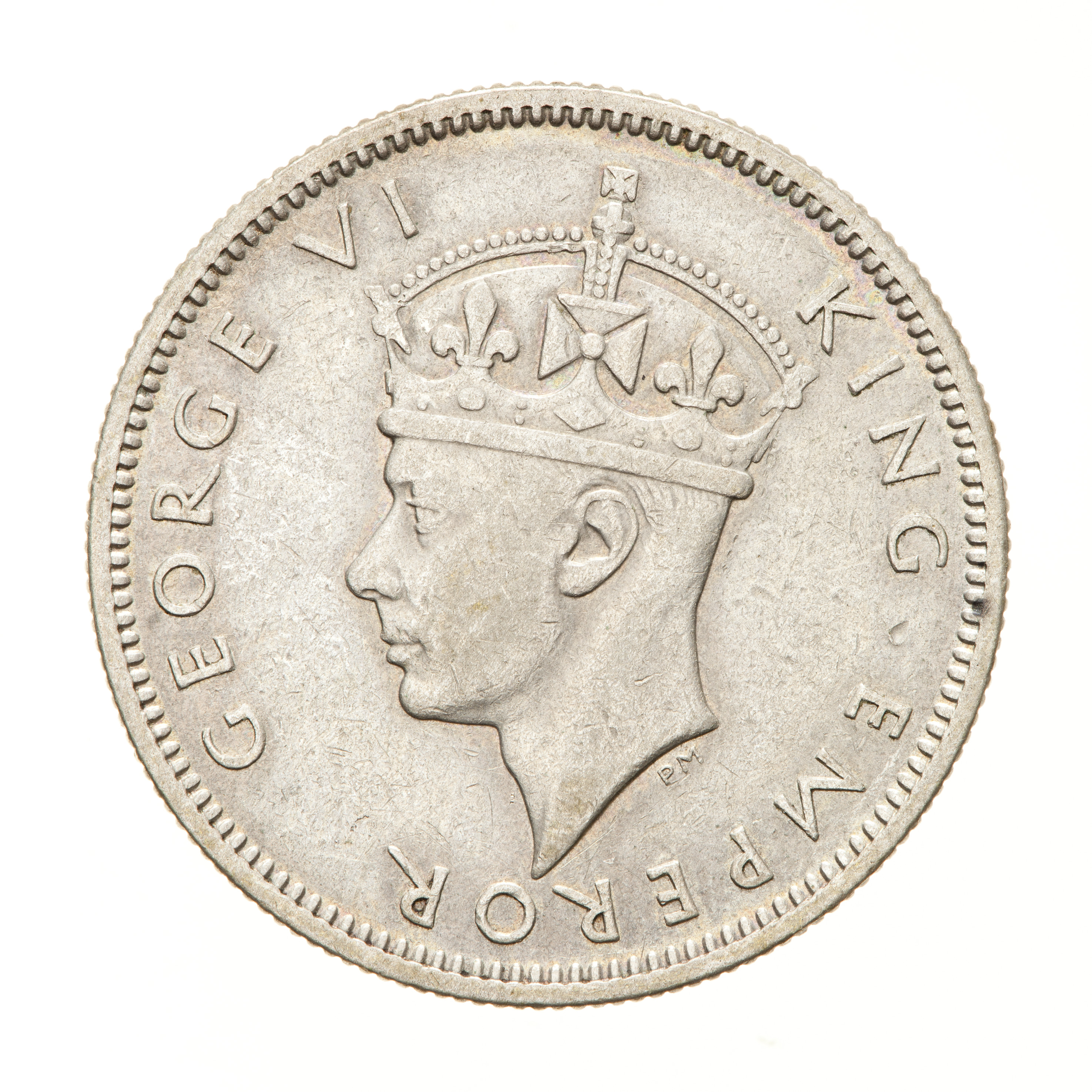 Coin - 1 Shilling, Fiji, 1938: crowned head of the King facing left; around, GEORGE VI KING EMPEROR - Obverse