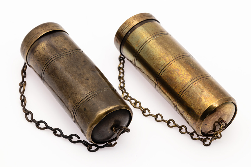 Two brass cylinders