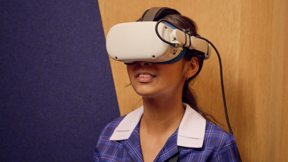 A student in the Road to Zero Learning Studio wearing a virtual reality headset 