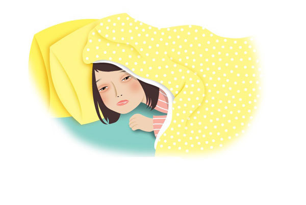 A girl hiding under the doona