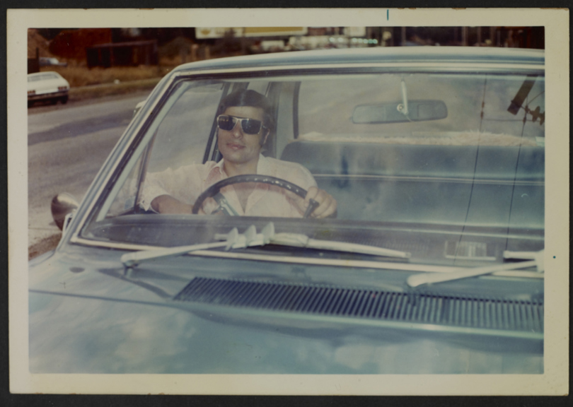 Portrait of a man at the wheel of a car, ca. 1972. 