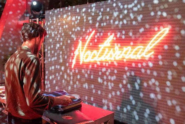 A Dj playing at Nocturnal, Melbourne Museum.