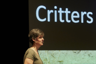 Curator of Herpetology Jane Melville presenting a talk at Melbourne Museum Theatre.