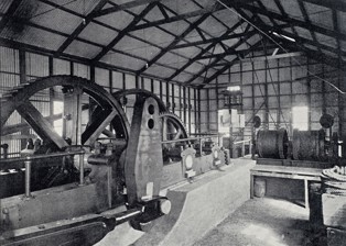 Interior view of engine house showing mining pumping equipment.