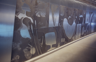 Zinc wall art work by First Peoples artist Judy Watson.