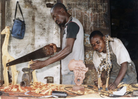 Two men doing woodwork