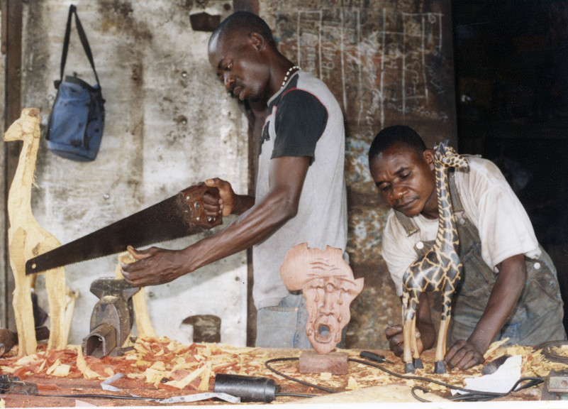 Two men doing woodwork