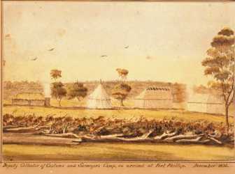 White tent on river bank