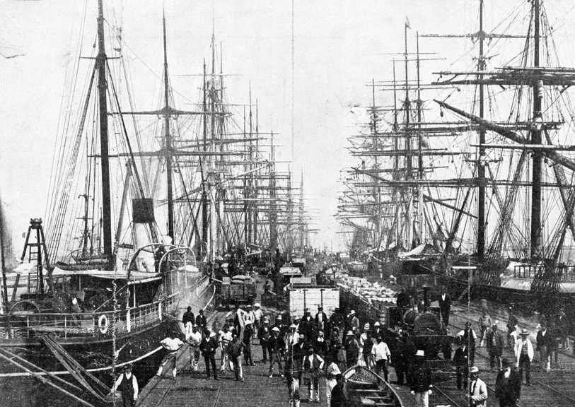 Hobsons Bay Railway Pier, Sandridge (now Station Pier, Port Melbourne), about 1878, showing one of two small steam locomotives used for shunting goods trucks on the pier.