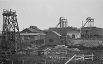 Poppet heads and buildings of the state mine at Wonthaggi. The number 9 and 10 shafts are shown.