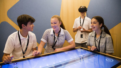 Students engaging with the TAC  Road To Zero Education Learning Centre interactives.