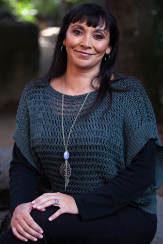 Portrait of Yulendj member Justice Nelson taken in Milarri Garden at Melbourne Museum.