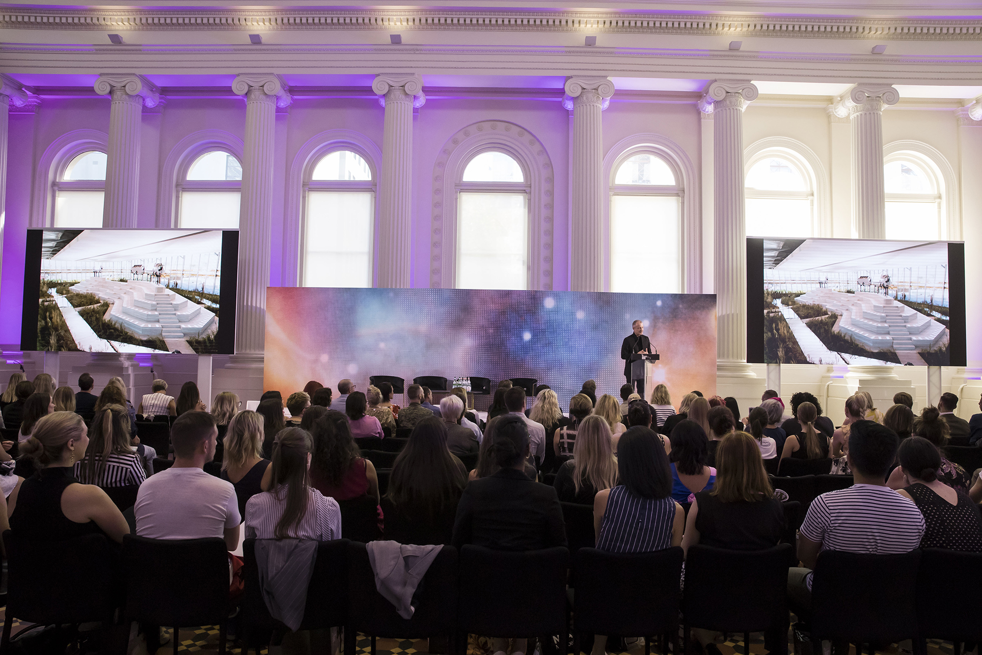 Event being held in the Long Room, Immigration Museum