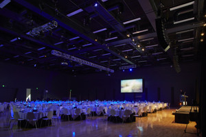 Large room with function tables set up banquet style