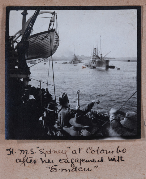 A black and white photo of ships in a harbour