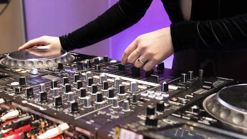 A DJ works her decks at Nocturnal, Melbourne Museum.