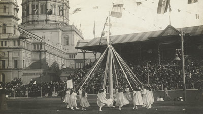 Maypole Dances at the Children's Fete on the Exhibition Oval, in front of the Duke and Duchess of Cornwall and York, on 11 May 1901. 