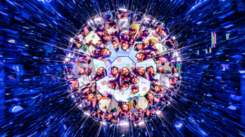 A mirror ball made of images of children smiling.