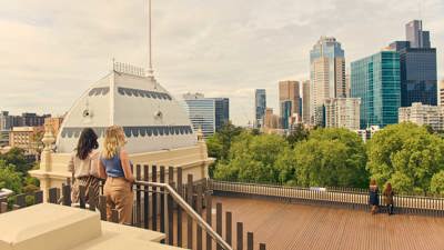 People enjoying the view from the Dome Promenade rooftop.