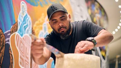 Close up of the artist Jade Kennedy at work